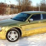 Аренда на свадьбу лимузина Chrysler 300C (Rolls-Royce) белого цвета.